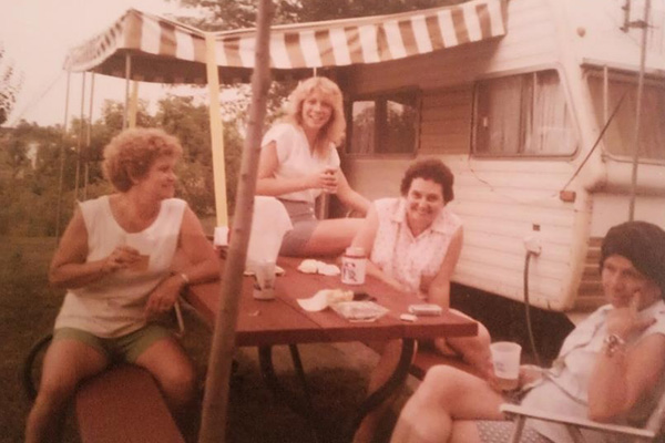 people-hanging-out-on-picnic-table.jpg